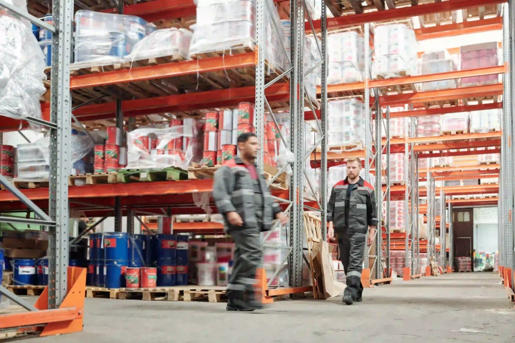 two young intercultural male workers in uniform mo 2025 03 15 20 45 24 utc